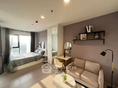 Modern studio apartment with cozy living area and stylish decor