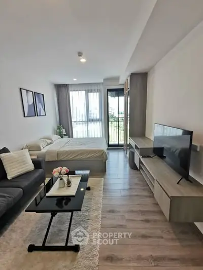 Modern studio apartment with stylish decor and natural light