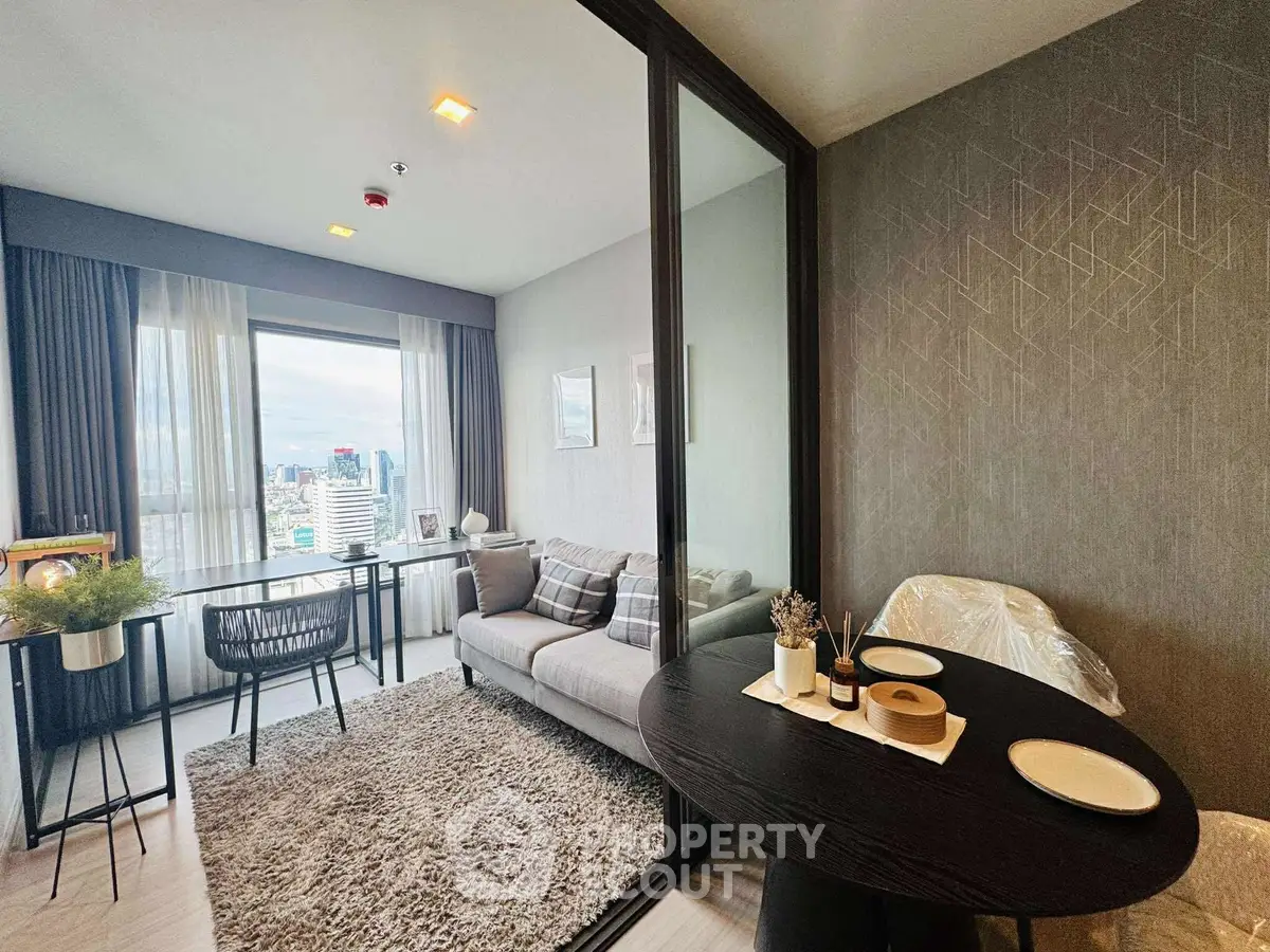 Modern living room with city view, cozy seating, and elegant dining area.