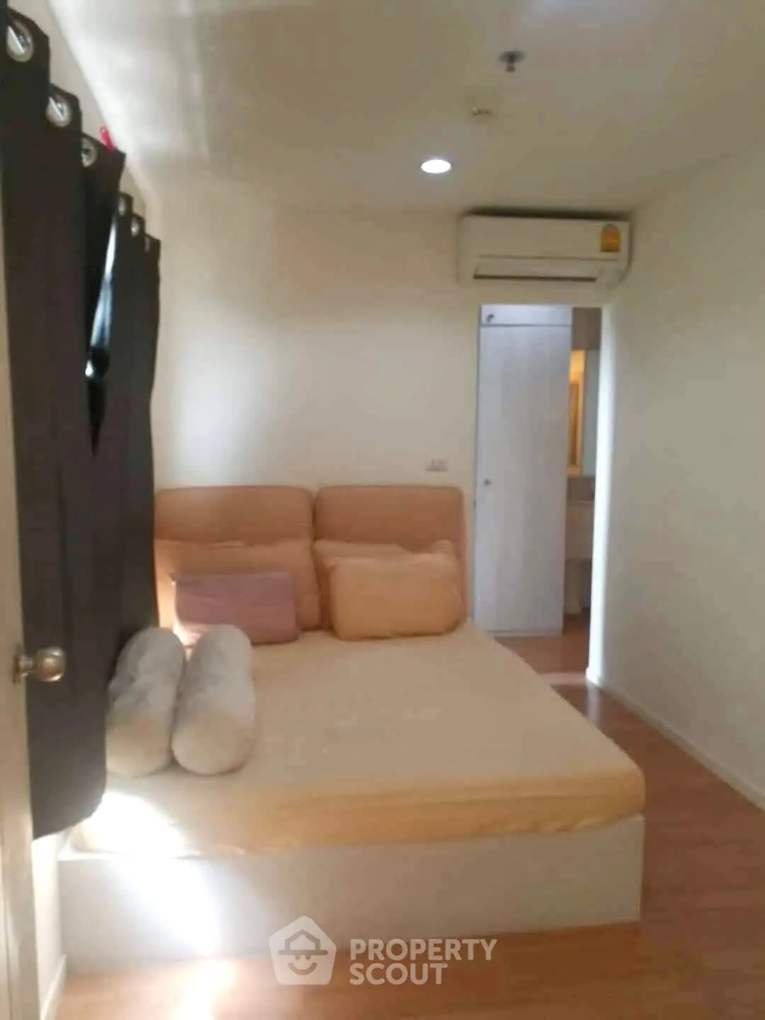 Cozy bedroom with modern air conditioning and soft lighting