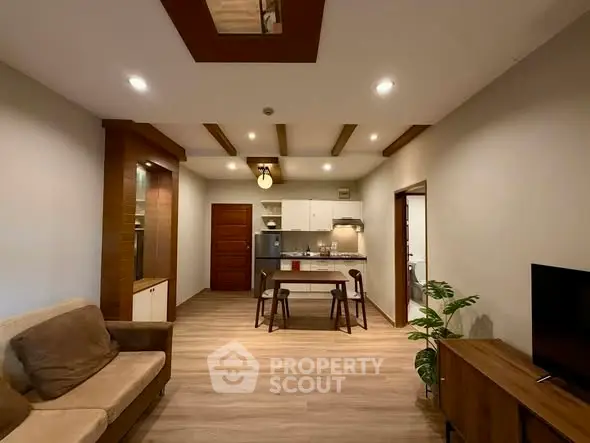 Spacious modern living room with open kitchen and stylish decor