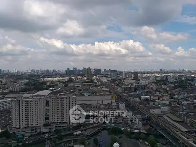 Stunning cityscape view from high-rise building showcasing urban skyline and expansive horizon.