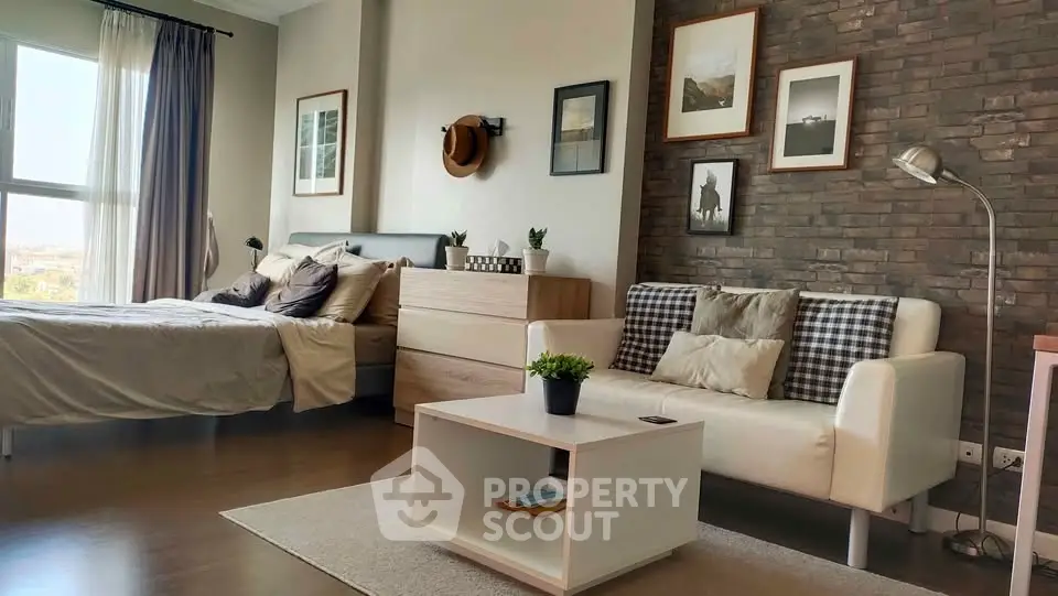 Modern studio apartment with stylish decor and natural light