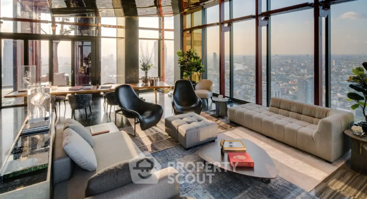 Luxurious high-rise living room with panoramic city views and modern furnishings.
