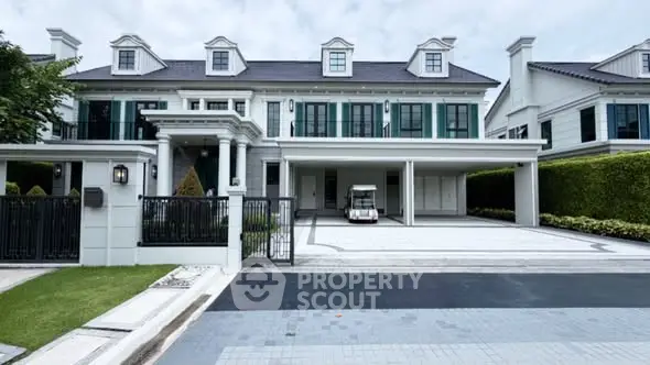 Luxurious modern mansion with spacious driveway and elegant architecture in a serene neighborhood.