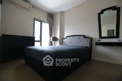 Modern bedroom with stylish bed and elegant decor in a cozy apartment