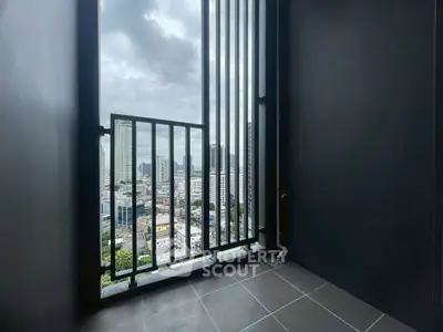 Stunning city view from a modern balcony with sleek railing design.