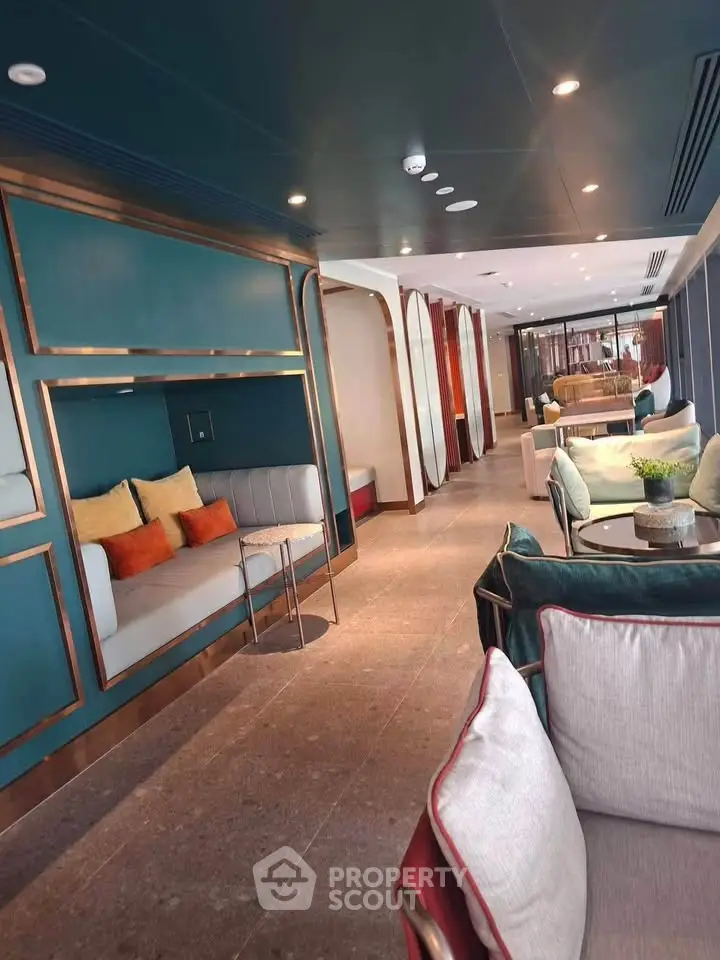 Luxurious modern living room with elegant seating and stylish decor, perfect for relaxation and entertainment.