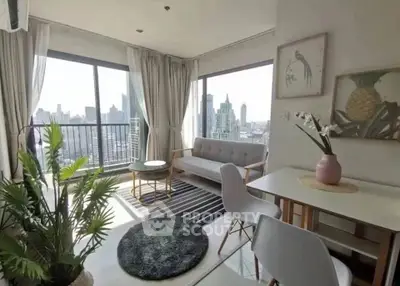 Bright modern living room with city view, stylish decor, and natural light.
