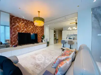 Luxurious open-plan living room with modern decor and stylish kitchen