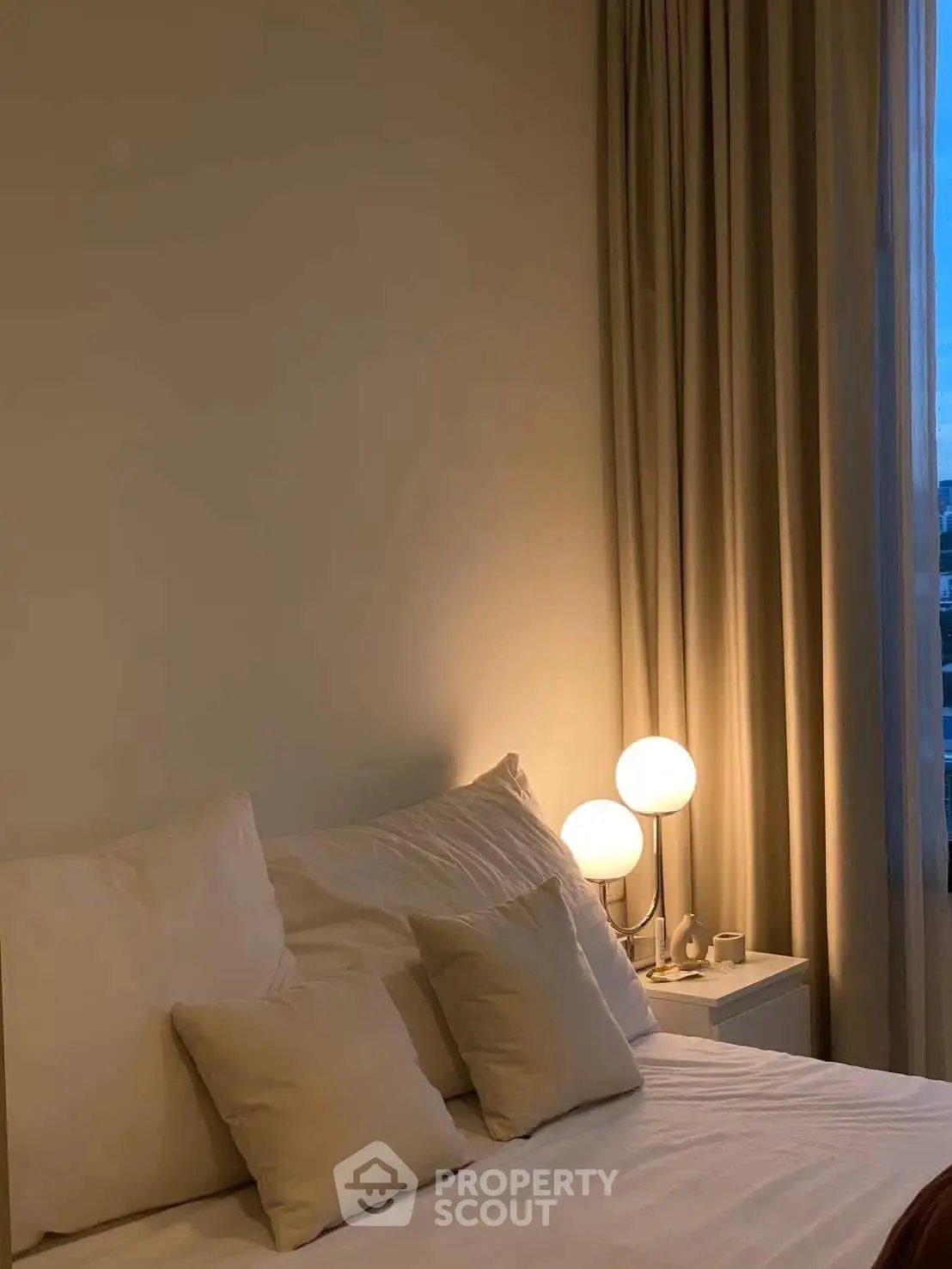 Cozy bedroom with soft lighting and elegant decor