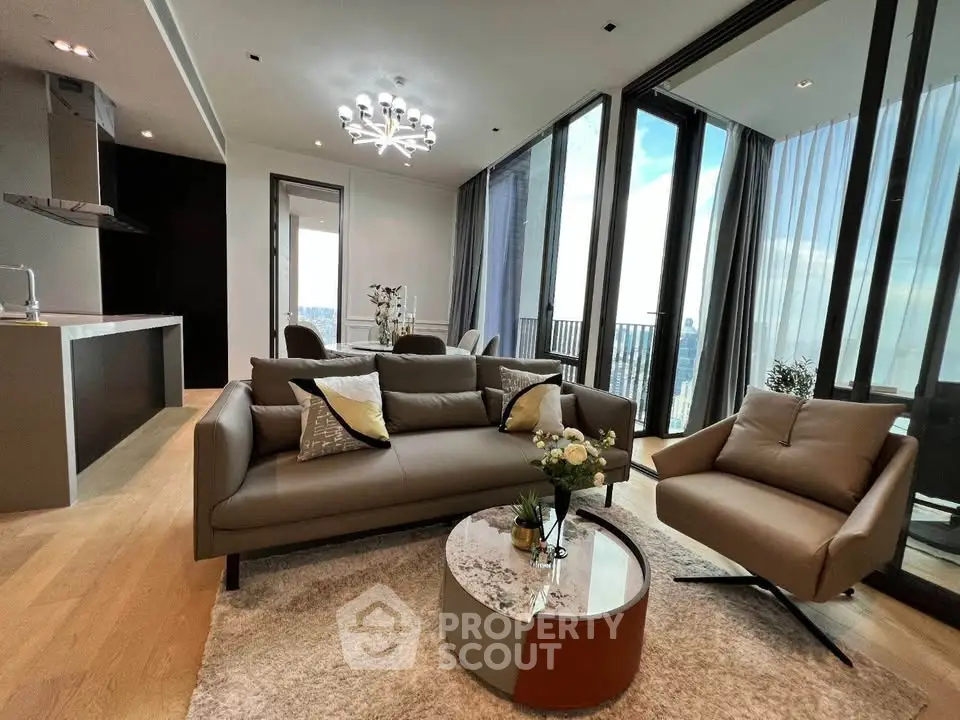Luxurious modern living room with floor-to-ceiling windows and stunning city view.