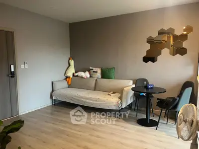 Modern living room with stylish decor and cozy seating area
