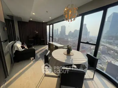 Modern living room with panoramic city view and stylish furniture