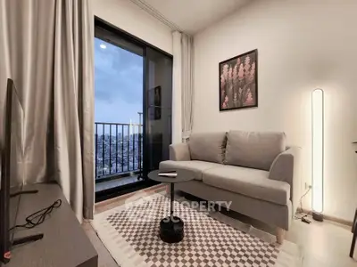 Modern living room with cozy sofa and city view balcony