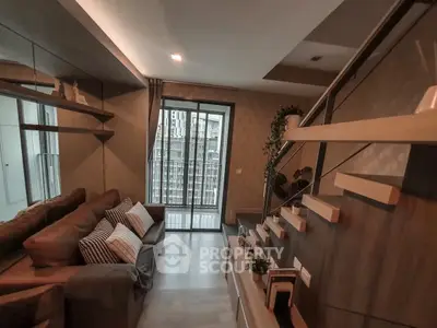 Modern living room with stylish staircase and city view balcony
