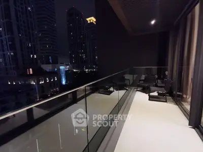 Luxurious city view from a spacious balcony at night, perfect for urban living.