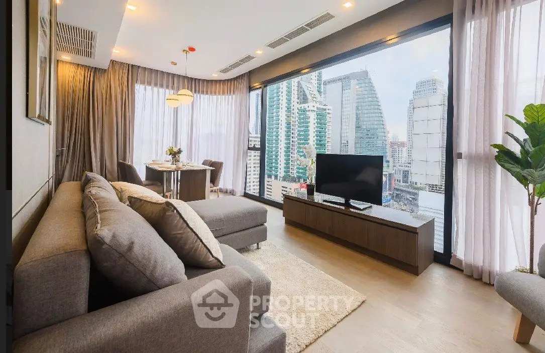 Luxurious living room with panoramic city view and modern furnishings