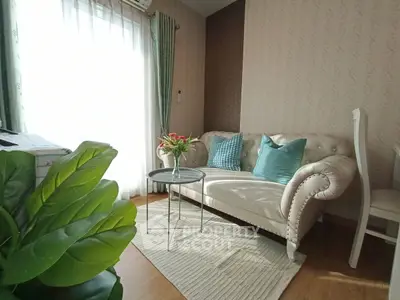 Charming living room with elegant sofa and natural light