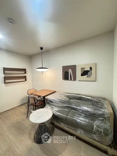 Modern living room with stylish furniture and contemporary art decor