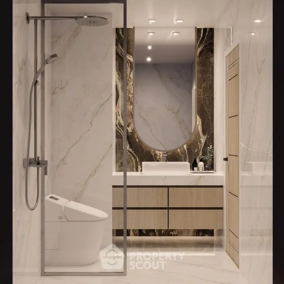 Luxurious modern bathroom with elegant marble design and sleek fixtures.