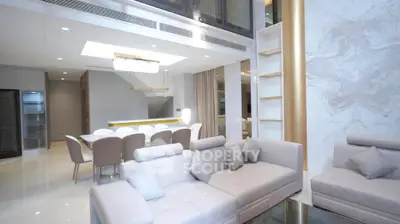Luxurious modern living room with elegant dining area and stylish decor