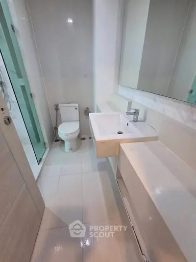 Modern bathroom with sleek fixtures and spacious layout