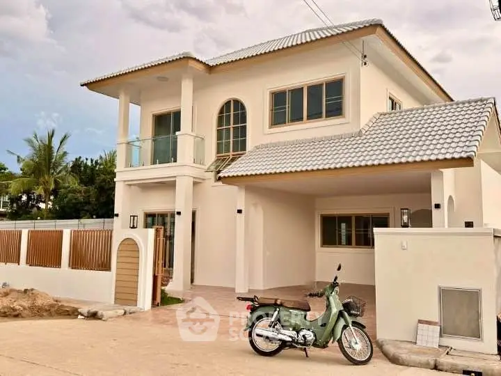 Stunning two-story house with modern design and spacious driveway