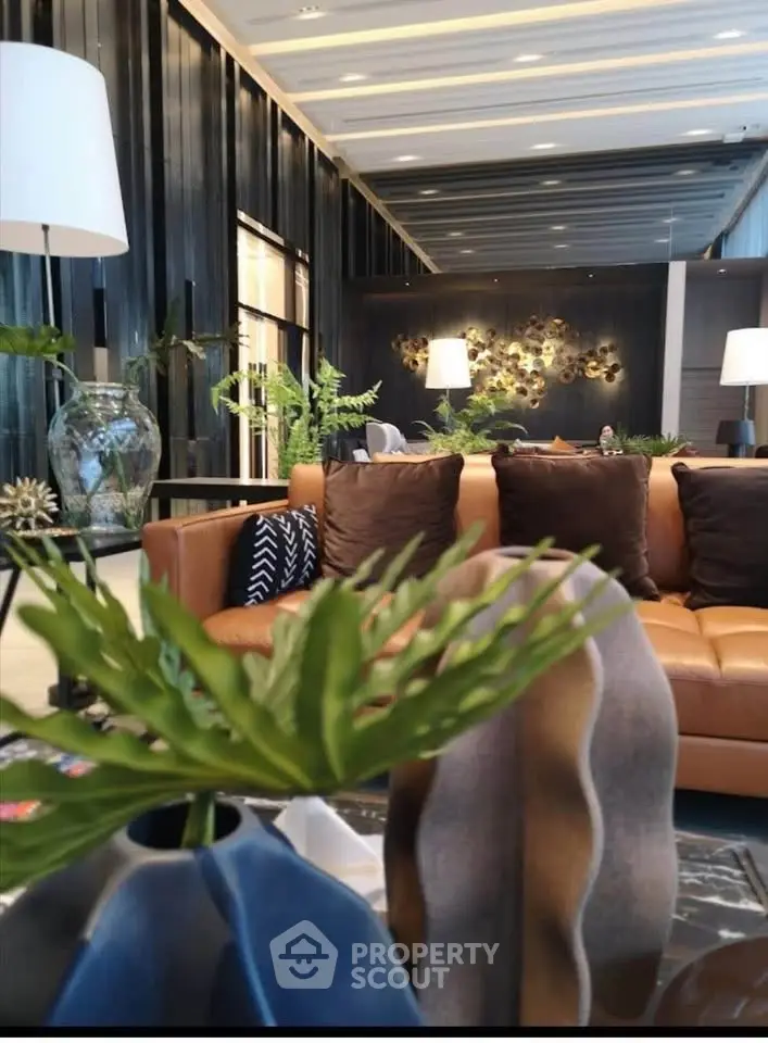Luxurious modern living room with elegant decor and stylish furniture, perfect for sophisticated urban living.