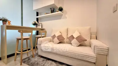 Cozy living room with plush sofa and modern decor in a stylish apartment