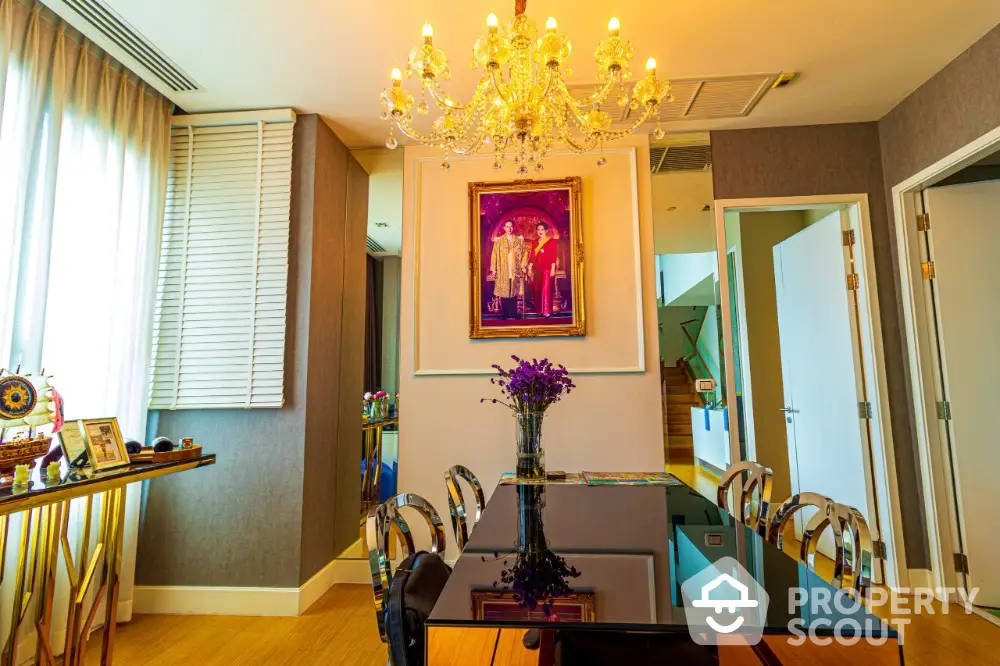 Elegant dining room with chandelier and modern decor