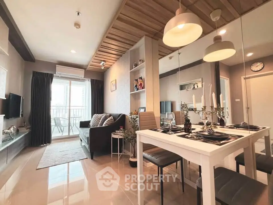 Modern living room with dining area and balcony access in stylish apartment
