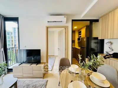 Modern living room with dining area and kitchen in a stylish apartment