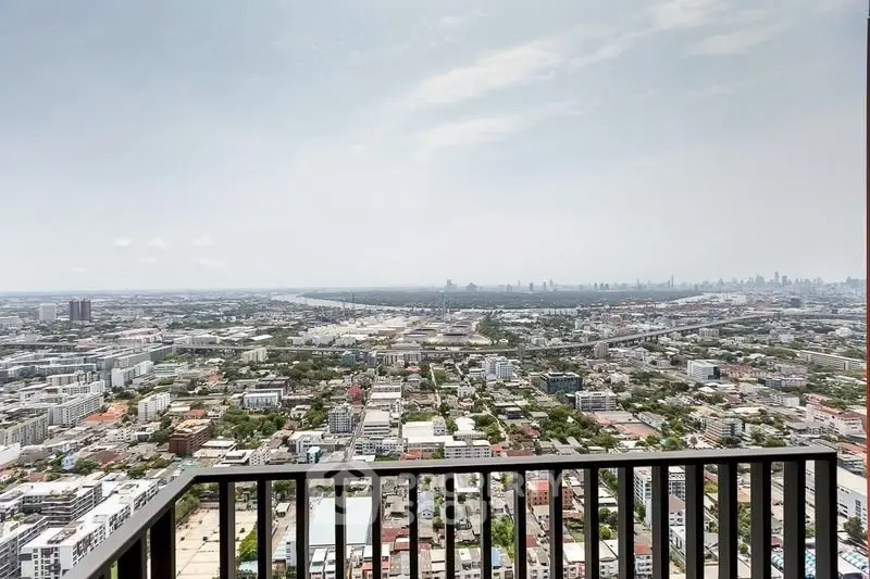 Stunning panoramic city view from high-rise balcony, perfect for urban living enthusiasts.