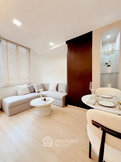 Modern living room with cozy seating and elegant decor