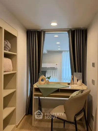 Cozy study nook with modern desk and chair, perfect for productivity.