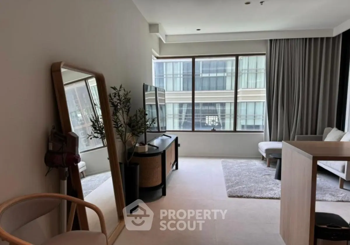 Modern living room with large window and stylish decor