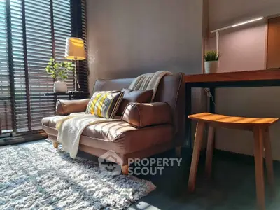 Cozy living room with stylish sofa and natural light