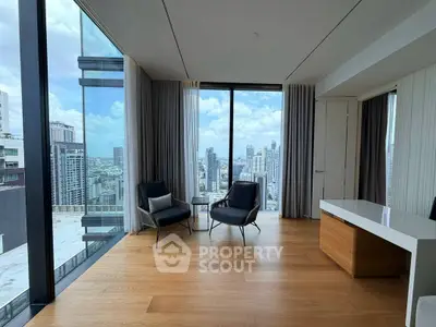Luxurious high-rise apartment with stunning city skyline view and modern interior design.