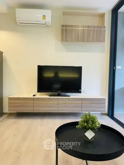 Modern living room with sleek TV setup and stylish decor