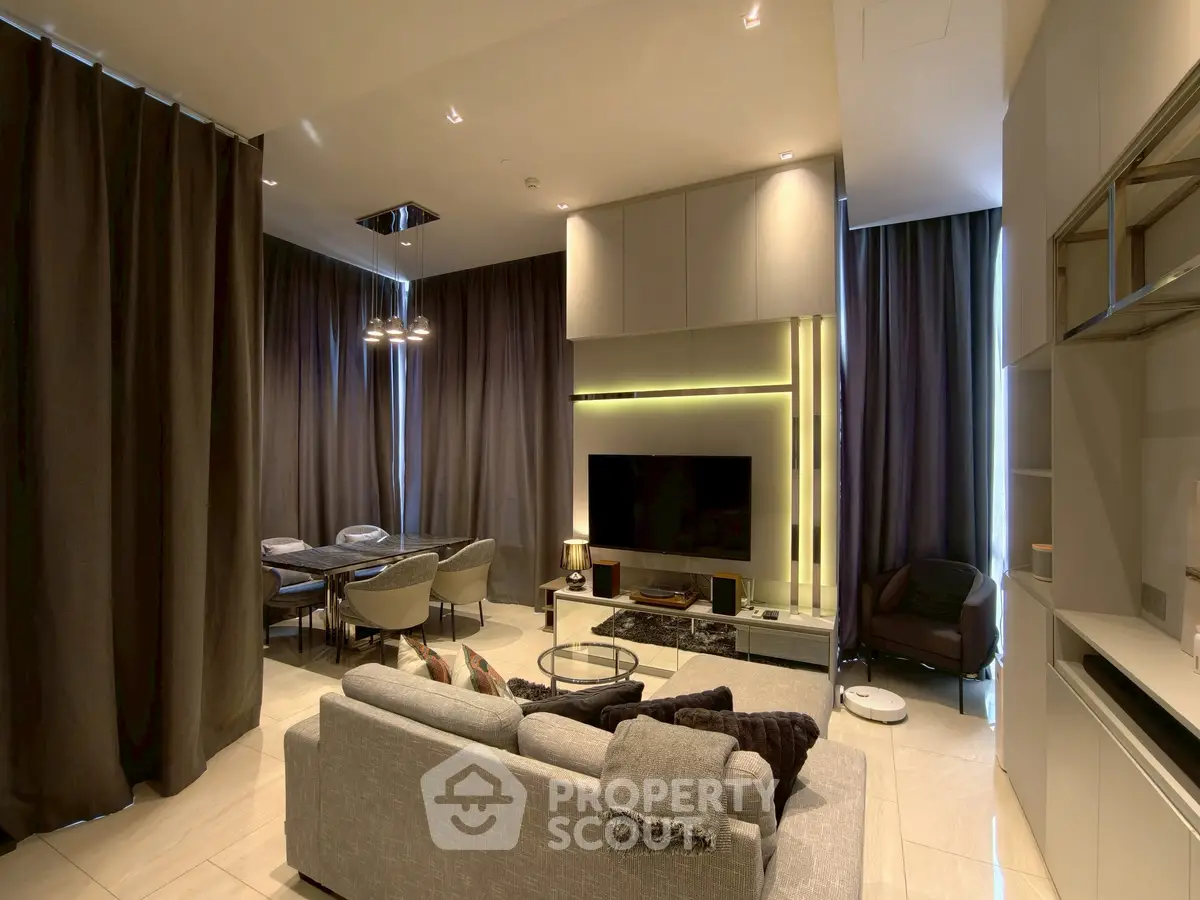 Luxurious modern living room with elegant decor and ambient lighting