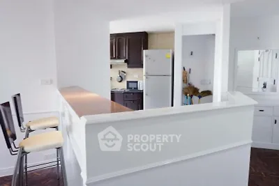 Charming kitchen with open layout and modern appliances in a cozy apartment.