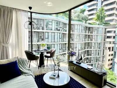 Luxurious modern living room with panoramic city view and elegant decor