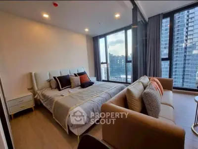 Luxurious modern bedroom with stunning city view and elegant furnishings