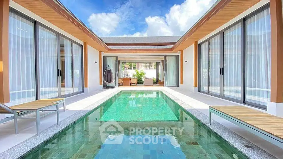 Luxurious villa with private pool and modern design, perfect for relaxation and entertainment.
