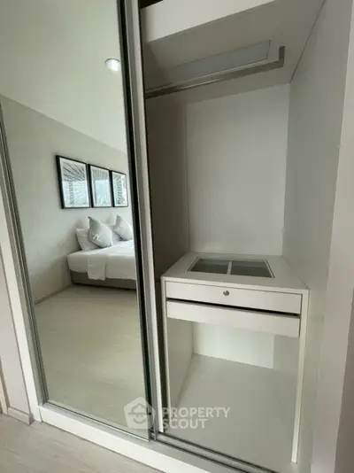 Modern bedroom with built-in wardrobe and stylish decor