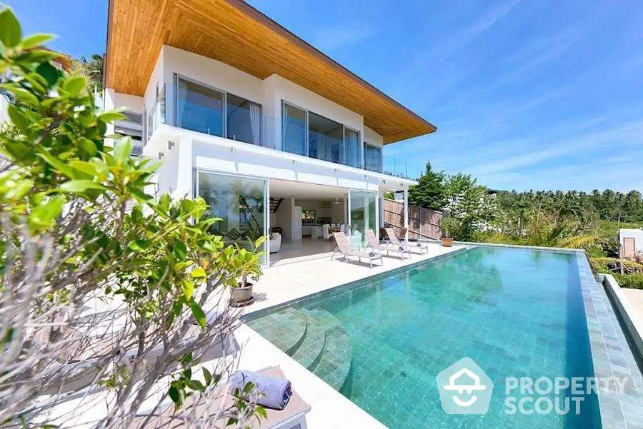 Luxurious modern villa with infinity pool and stunning tropical views