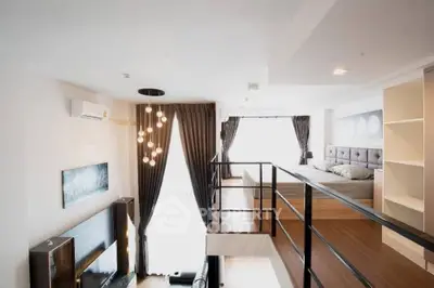 Modern loft apartment with stylish mezzanine bedroom and elegant lighting