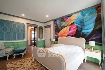 Luxurious bedroom with vibrant leaf mural and elegant furniture