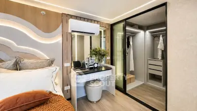 Luxurious bedroom with modern decor and walk-in closet
